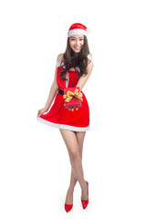 Full length portrait of a asian woman in santa claus cloth holdi