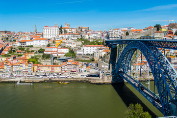 Fototapeta na wymiar Old Porto cityscape skyline with Dom Luis I Bridge and Douro River in Porto, Portugal