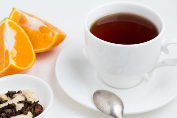 Obraz na płótnie Canvas a mug of tea and ginger with berries