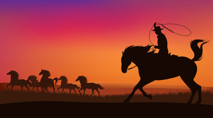 wild west sunset scene with horses and cowboy