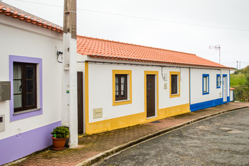 Traditional yellow, blue and white Alentejo Portuguese buildings in village in Portugal