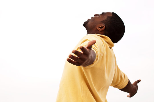 African American man with open arms. Man with open arms. Carefree. Worship.