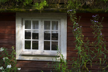 Fenster an einer alten Bauernhausfassade