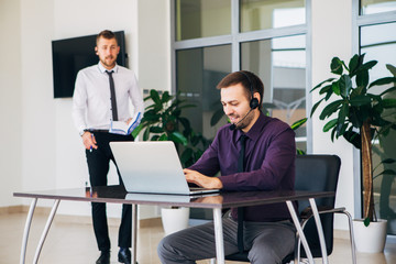 Fototapeta premium two man working in call center