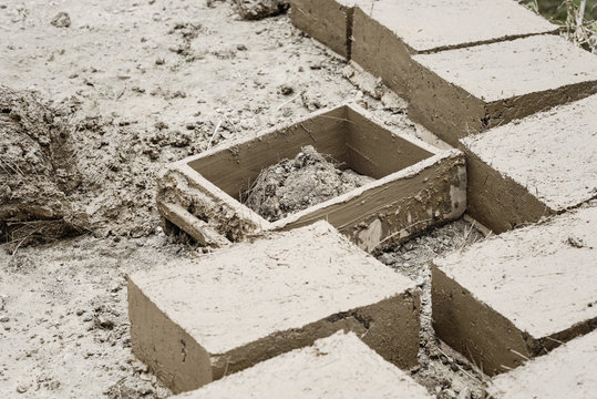 Traditional adobe mud bricks in Paru Paru Community Village, Pis