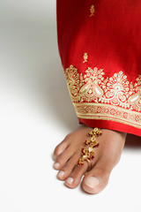 Close-up of woman's feet with traditional Indian toe ring