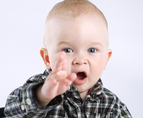 little boy pointing to the side