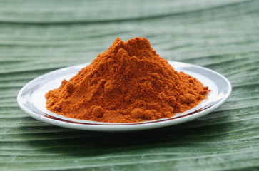 Still life of masala powder of a banana leaf