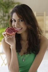 A woman eating fruit