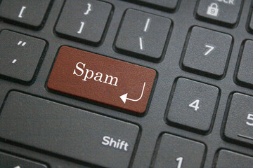 Close up of spam word on computer keyboard