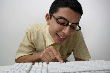Nerd typing on keyboard