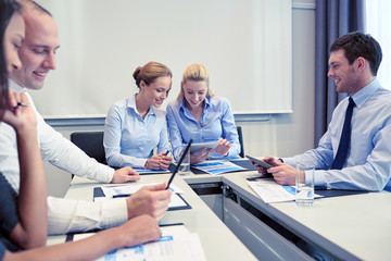 smiling business people meeting in office