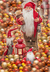 Santa Claus Christmas card.Old Santa surrounded with little santa's and christmas globes