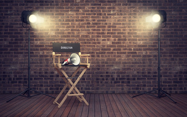 Fototapeta premium Film director's chair with megaphone and spotlights. 3D renderin