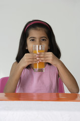 Girl with glass of juice