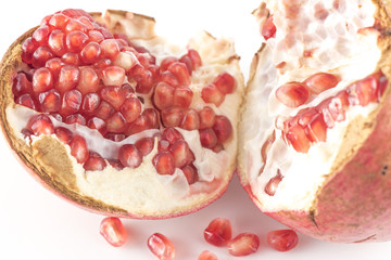 Pomegranate (Punica granatum) on white background