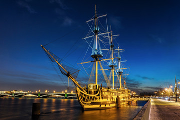 Fototapeta na wymiar An old frigate on Neva river in the evening, St Petersburg, Russia