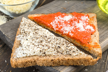 triangles of wholemeal bread spread with cream cheese and spicy