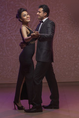 India, Man and woman posing while dancing