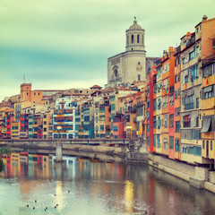 Fototapeta na wymiar historical jewish quarter in Girona, view of the river, Barcelona, Spain, Catalonia. Creative vintage filter affect