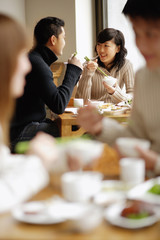 Couples eating at a restaurant
