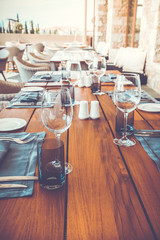 decorated  table with plates and serviettes
