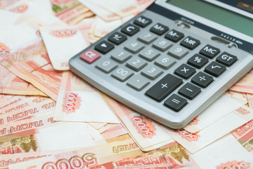 The calculator lies on big Russian money