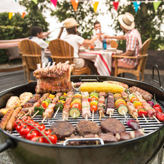 Family having a barbecue party in their garden