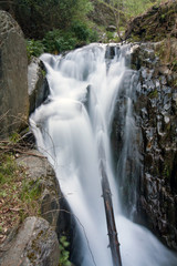 Natural waterfall in the mountains