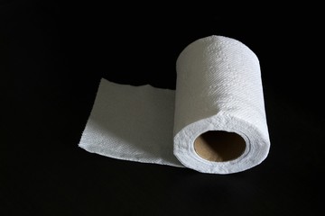 Crumpled paper ball  on  black background