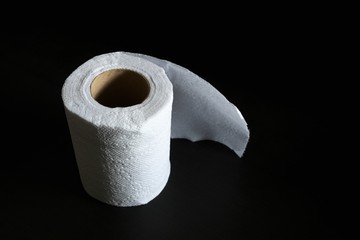 Crumpled paper ball  on  black background
