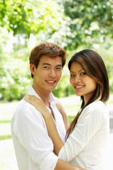 Fototapeta premium Couple standing together, looking at camera