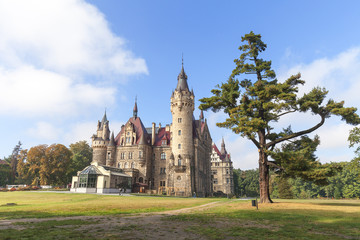 Fototapeta na wymiar View on 17 th century Moszna Castle on a sunny day, Poland