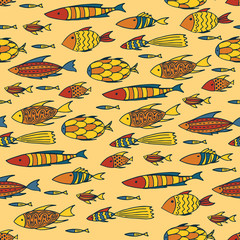 Seamless pattern with shoal of small different fishes on yellow background. Handmade cartoon style