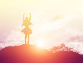 Happy woman jumping against beautiful sunset. Freedom, enjoyment