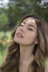 Fototapeta premium Portrait of beautiful woman with natural light