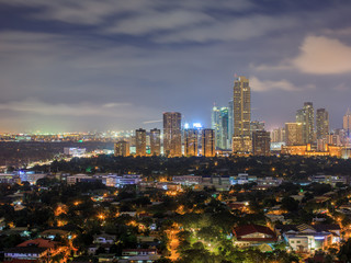 Fototapeta na wymiar Night view of Makati, the business district of Metro Manila, Philippines