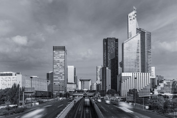 Skyscrapers with glass facade. Modern buildings in Paris business district. Concepts of economics, financial, future.  Copy space for text. Dynamic composition. Toned