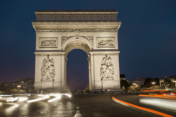 Fototapeta na wymiar Triumphal arch. Paris. France. View of Place Charles de Gaulle. Famous touristic architecture landmark in summer night. Napoleon victory monument. Symbol of french glory. World historical heritage.