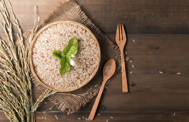 brown Jasmine rice in bamboo basket