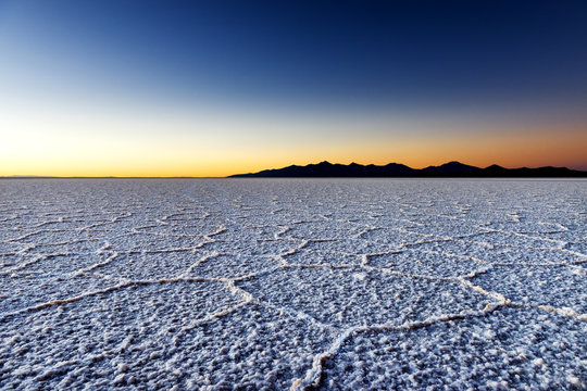 Sunrise at the Salar de Uyuni in Bolivia, South America; Concept for travel in Bolivia and South America