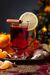 The mulled wine with spices and tangerines