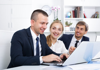 three business colleagues in office.