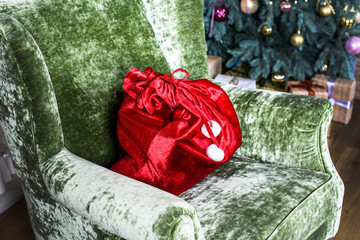 beautiful chair with Christmas gift bag