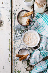 Fototapeta na wymiar Ingredients for making rice pudding