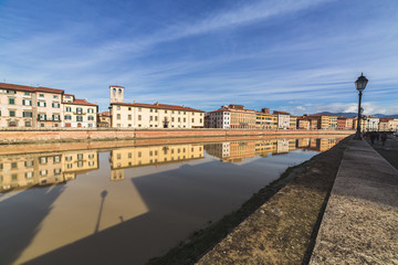 Fototapeta na wymiar Arno River in Pisa shoot in daylight
