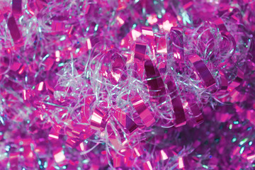Background of pink and white tinsel.