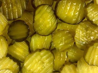 Dill pickle slices filling the frame