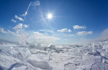 Abwaschbare Fototapete Ice floe and sun on winter Baikal lake © Serg Zastavkin
