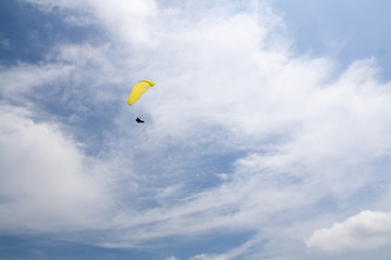 Paragliding in front of blue sky